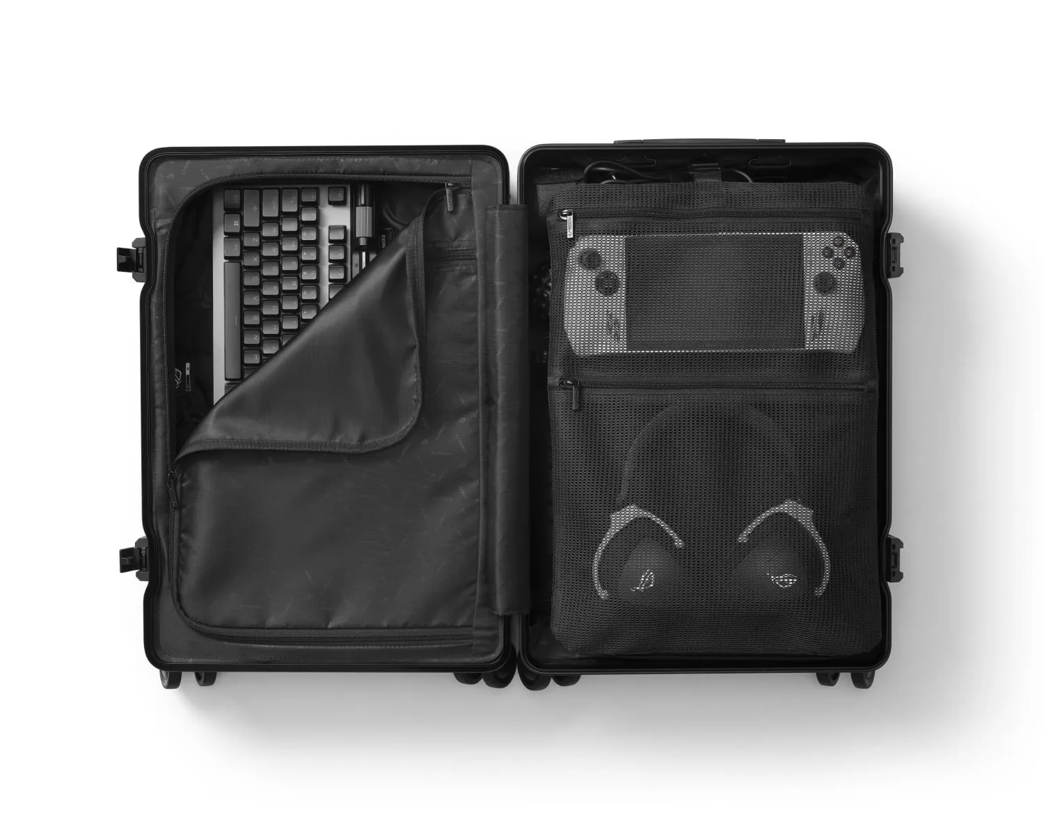 View of the ROG SLASH Hard Case Luggage opened, with keyboard, headphones and ROG Ally visible inside