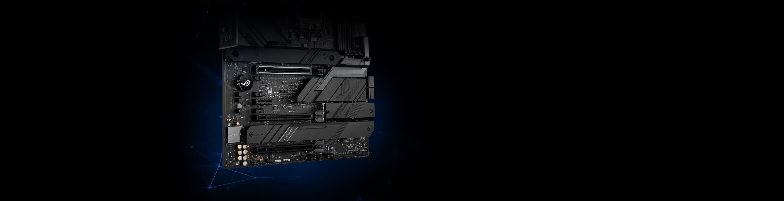 Bottom half of an ROG Strix motherboard, with blue outlines around the dual M.2 heatsinks and shields.