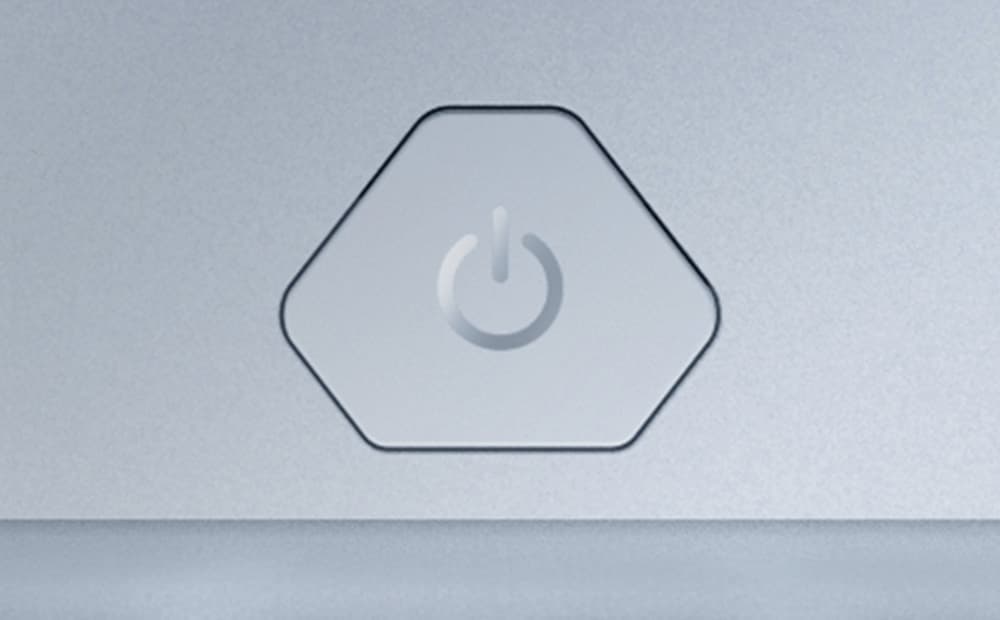 Extreme close-up of the new power key on the Platinum White Zephyrus G16.