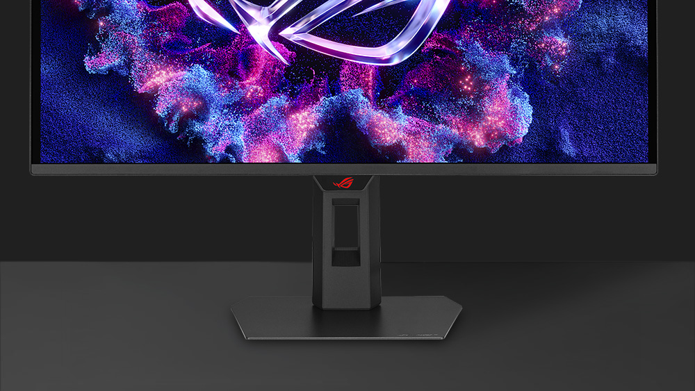 XG27AQDMES 正面图,展示手机放置于设备凹槽中