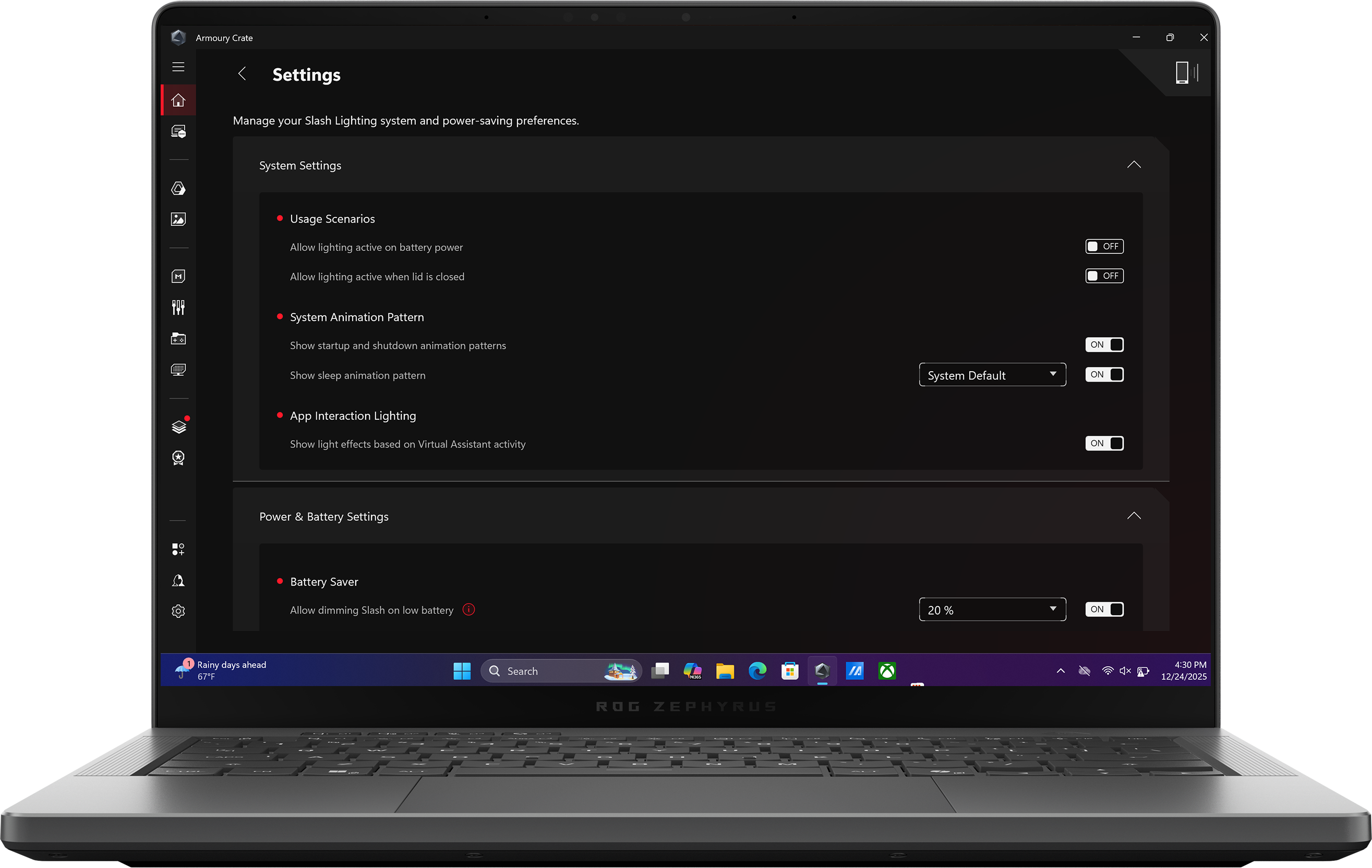 An Eclipse Grey 幻14 Air with the lid open and the main page of Armoury Crate on screen.