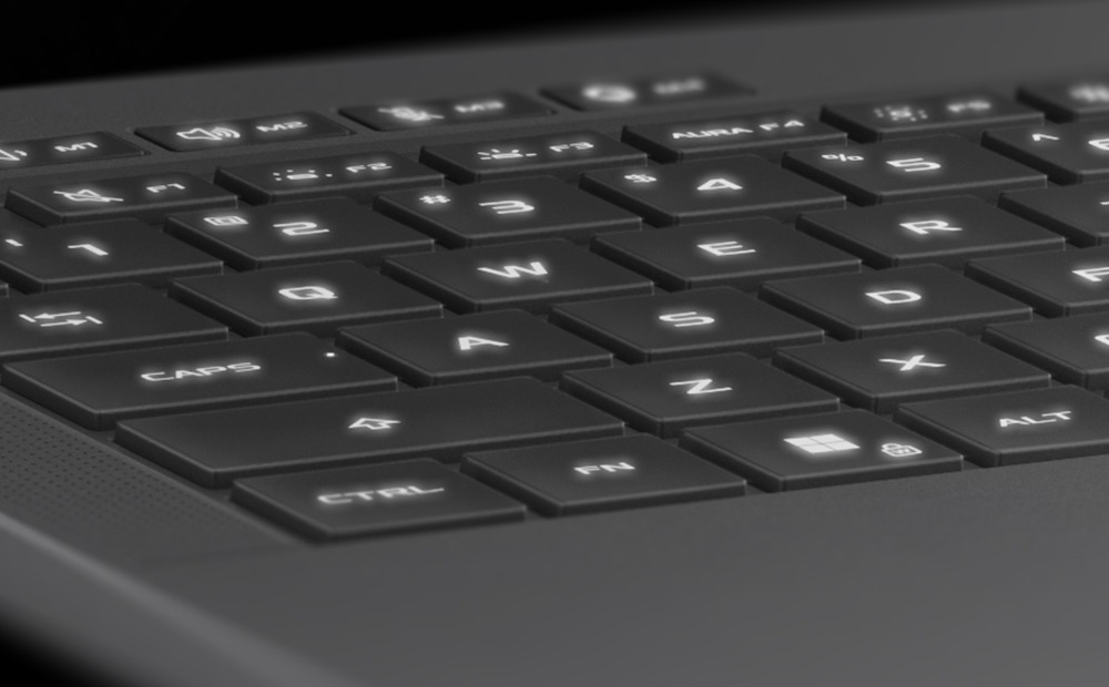 Extreme close up of the WASD keys on the Eclipse Grey 幻16 Air, with the keys illuminated in blue.