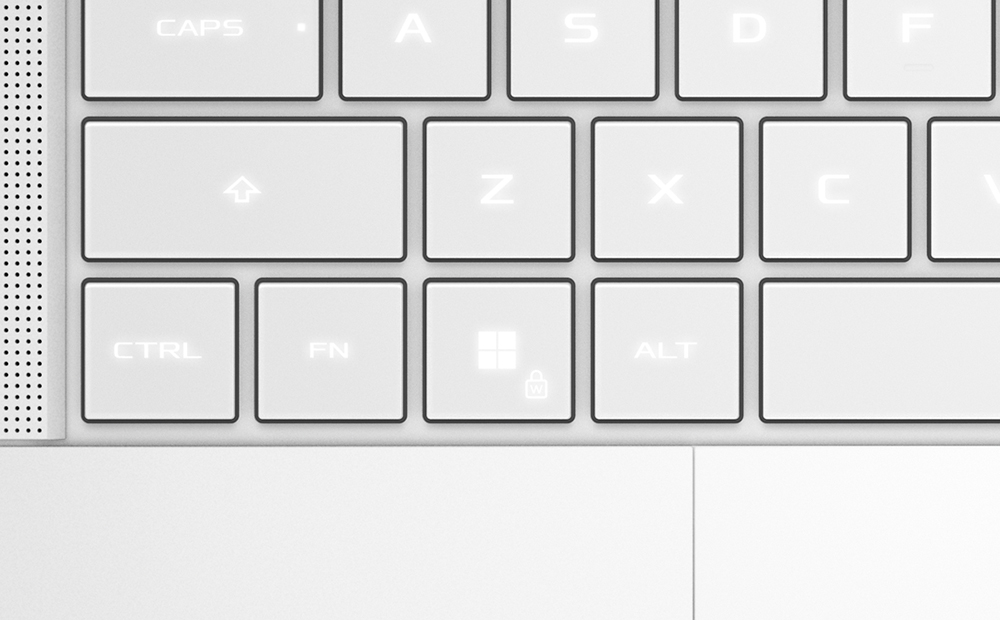 An extreme close up of a Platinum White 幻16 Air’s keyboard.