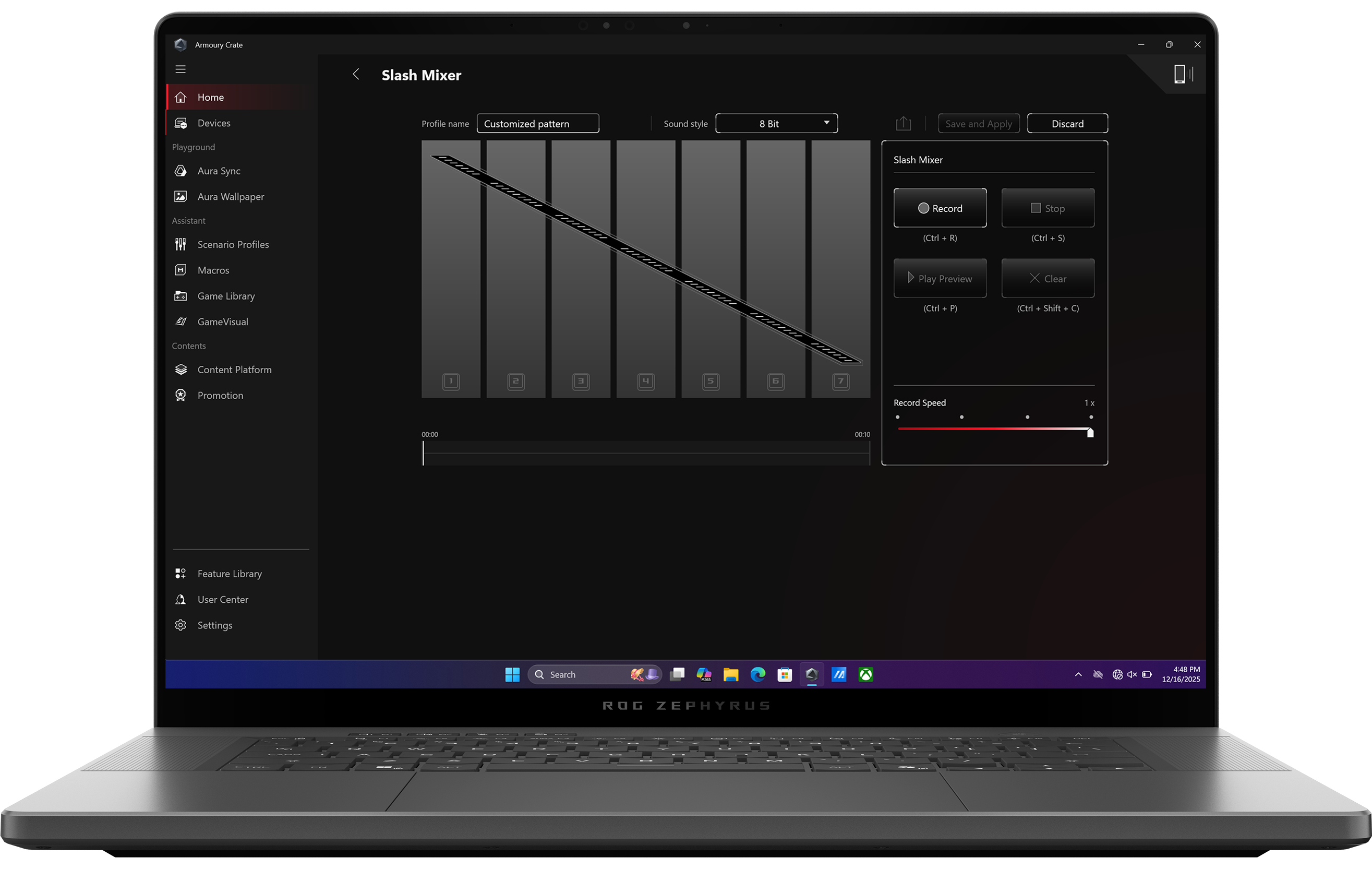 An Eclipse Grey 幻16 Air with the lid open and the main page of Armoury Crate on screen.