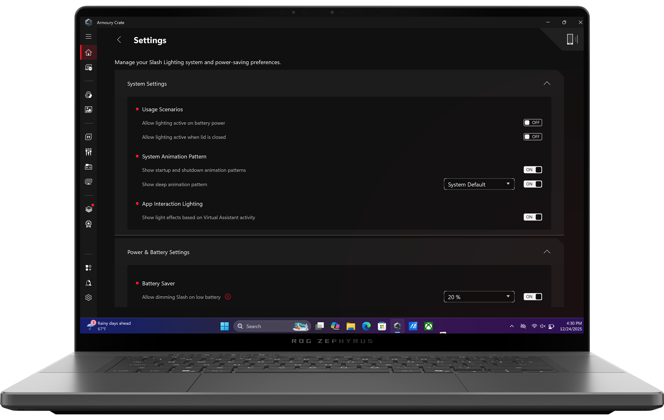 An Eclipse Grey 幻16 Air with the lid open and the main page of Armoury Crate on screen.