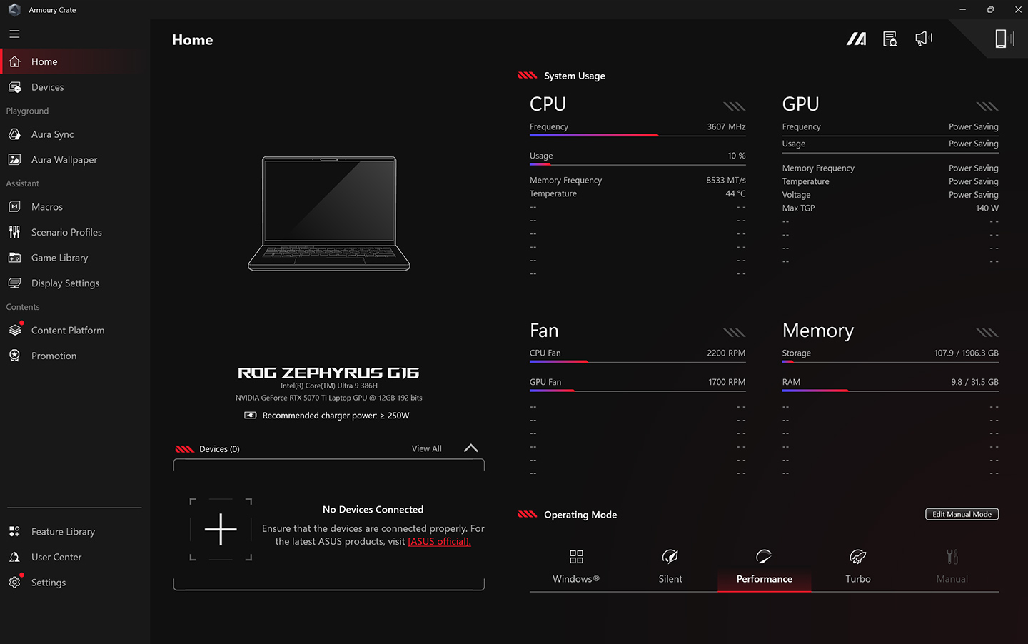 An Eclipse Grey 幻16 Air with the lid open and the main page of Armoury Crate on screen.