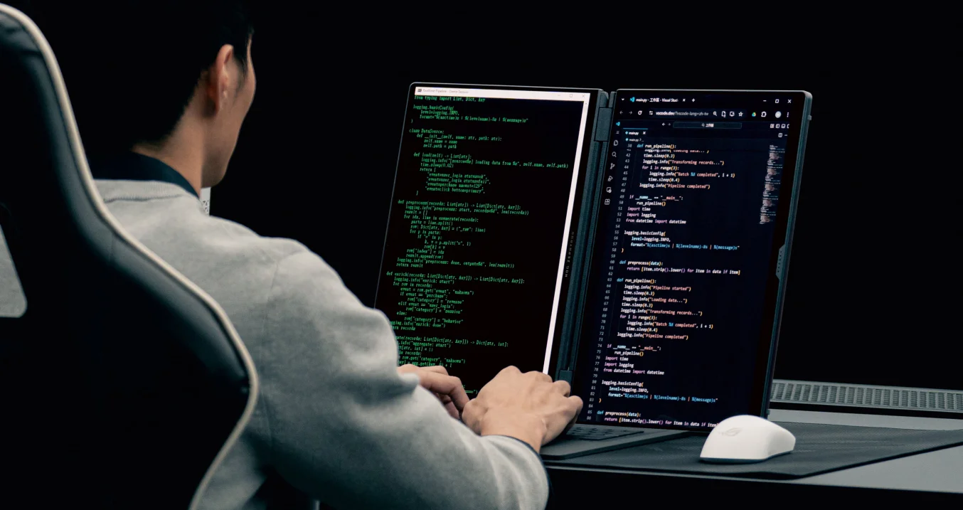 A man coding with the book mode.