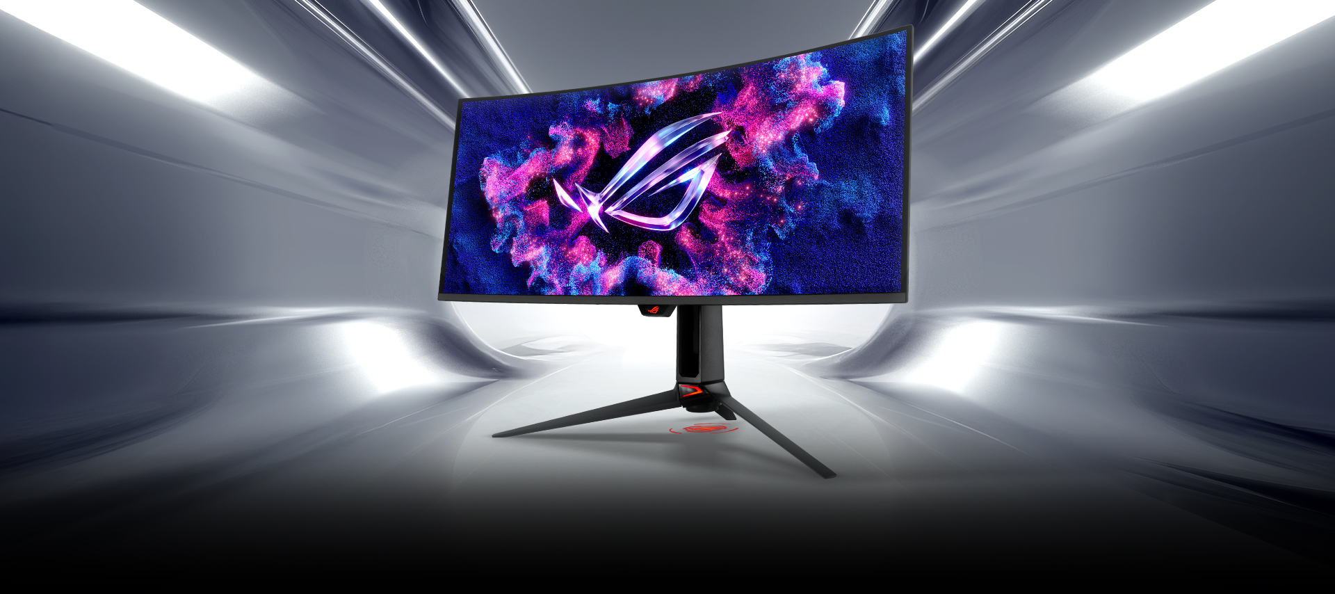 面向未来的台式机设置，配备 ROG OLED 显示器，显示生动的粉色和蓝色图形，周围环绕着游戏装备和白色 PC 机箱，房间内灯光呈紫色。屏幕旁边的粗体字写着 "一应俱全"。