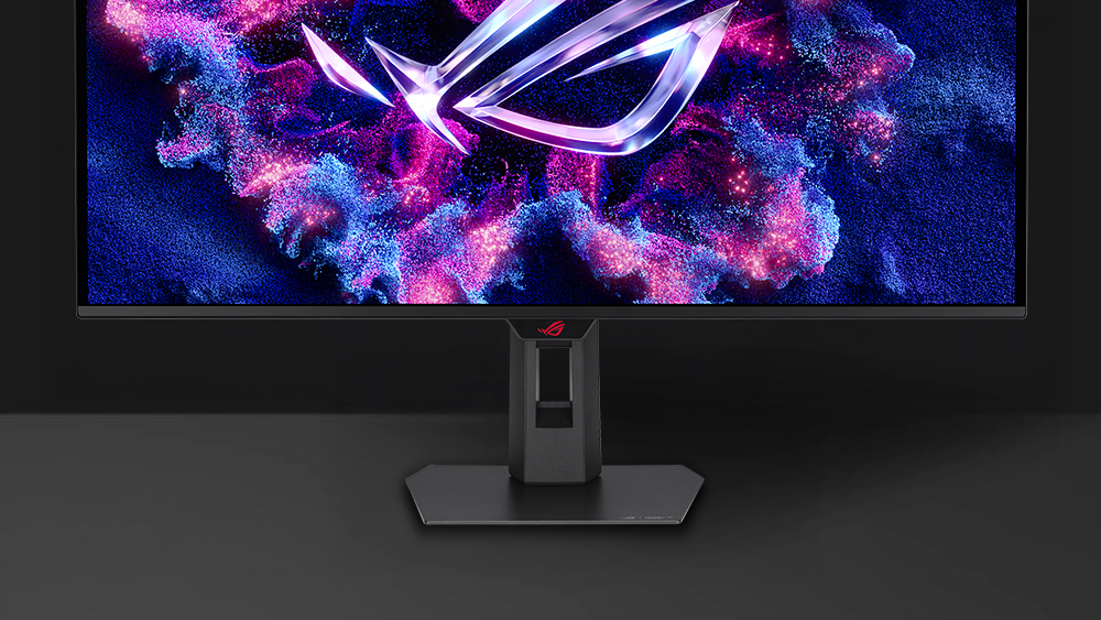 XG32UQDMS 正面图，展示手机放置于设备凹槽中