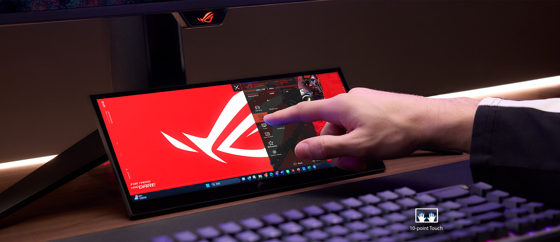 并排显示图像,以显示 32:9 显示器和 24:9 ROG XG129C 显示器在显示 16:9 游戏内容时更宽的黑色侧边栏。