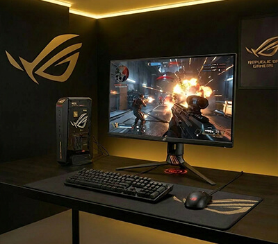 gamer playing AAA games with ROG NUC edition 20 and a WiFi symbol floating on top