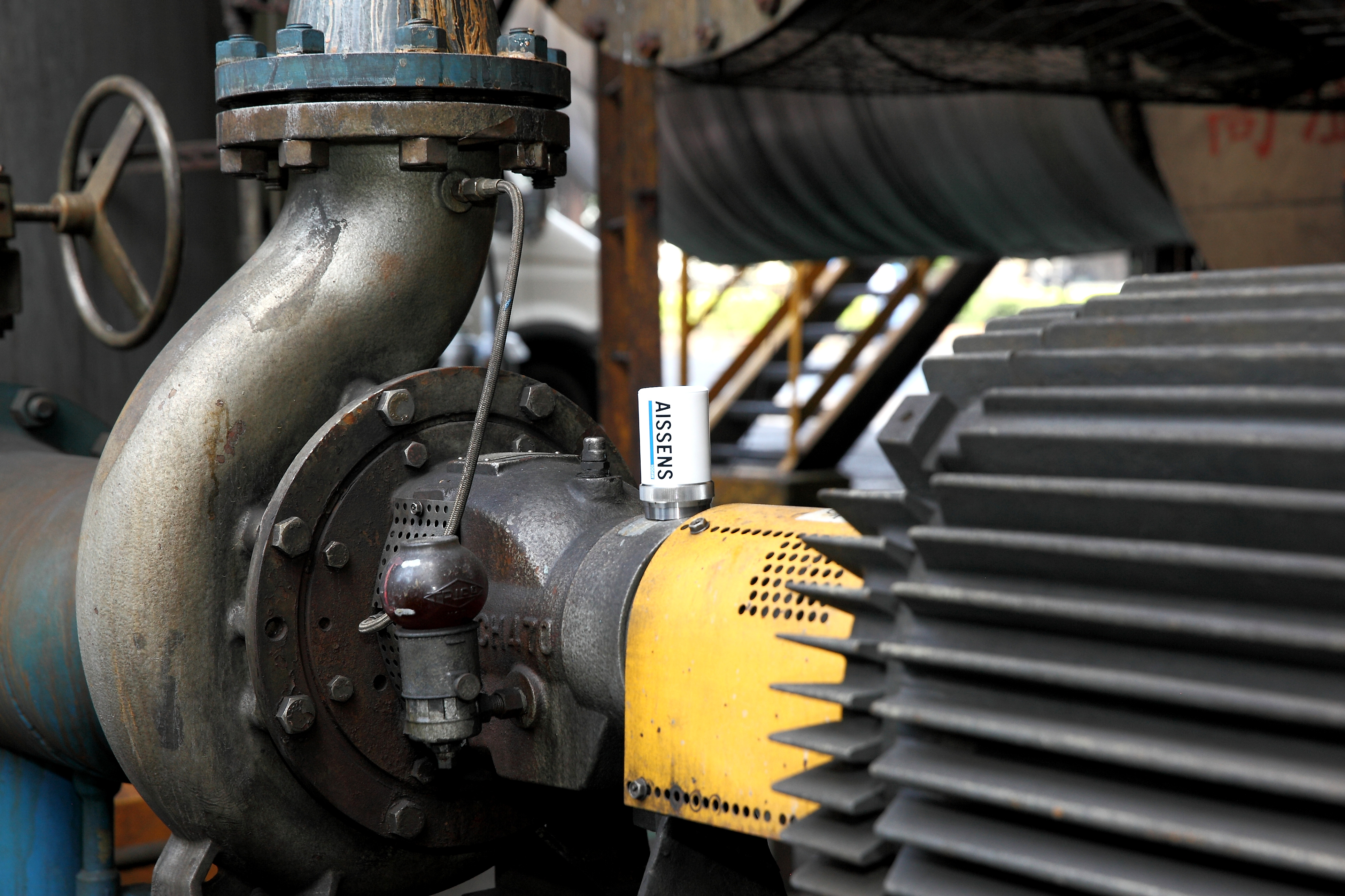 ASUS AISSENS wireless sensors capturing real-time multi-axial vibration and temperature data at Linyuan Plant, forming the data foundation for AI predictive maintenance.