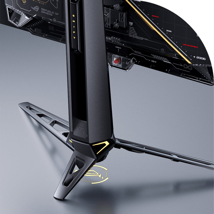 ROG OLED 显示器底座特写，展示了其银灰色配色、棱角分明的结构和蓝色 LED 点缀的未来派设计