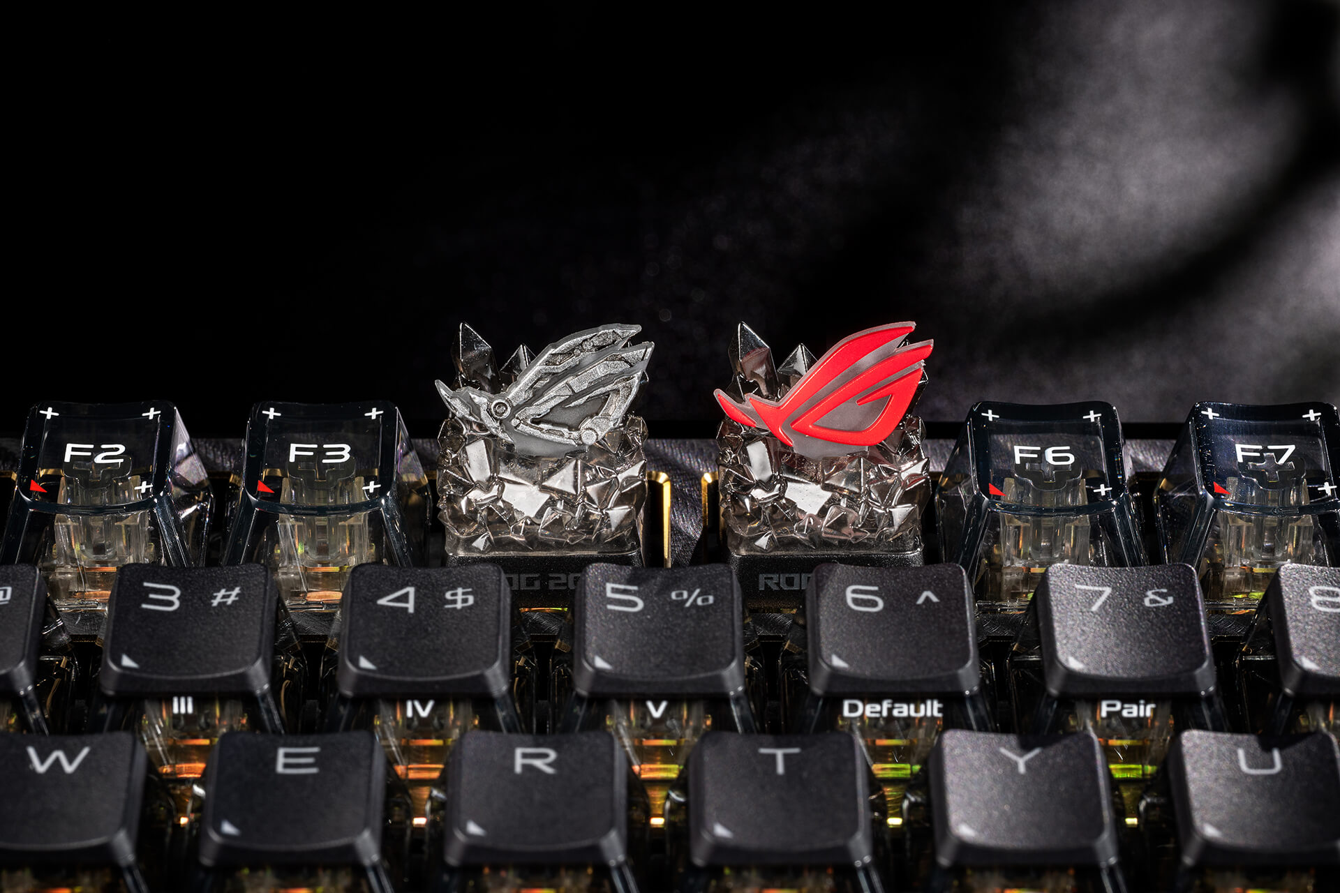ROG logo keycap hidden edition and ROG logo keycap placed on a keyboard