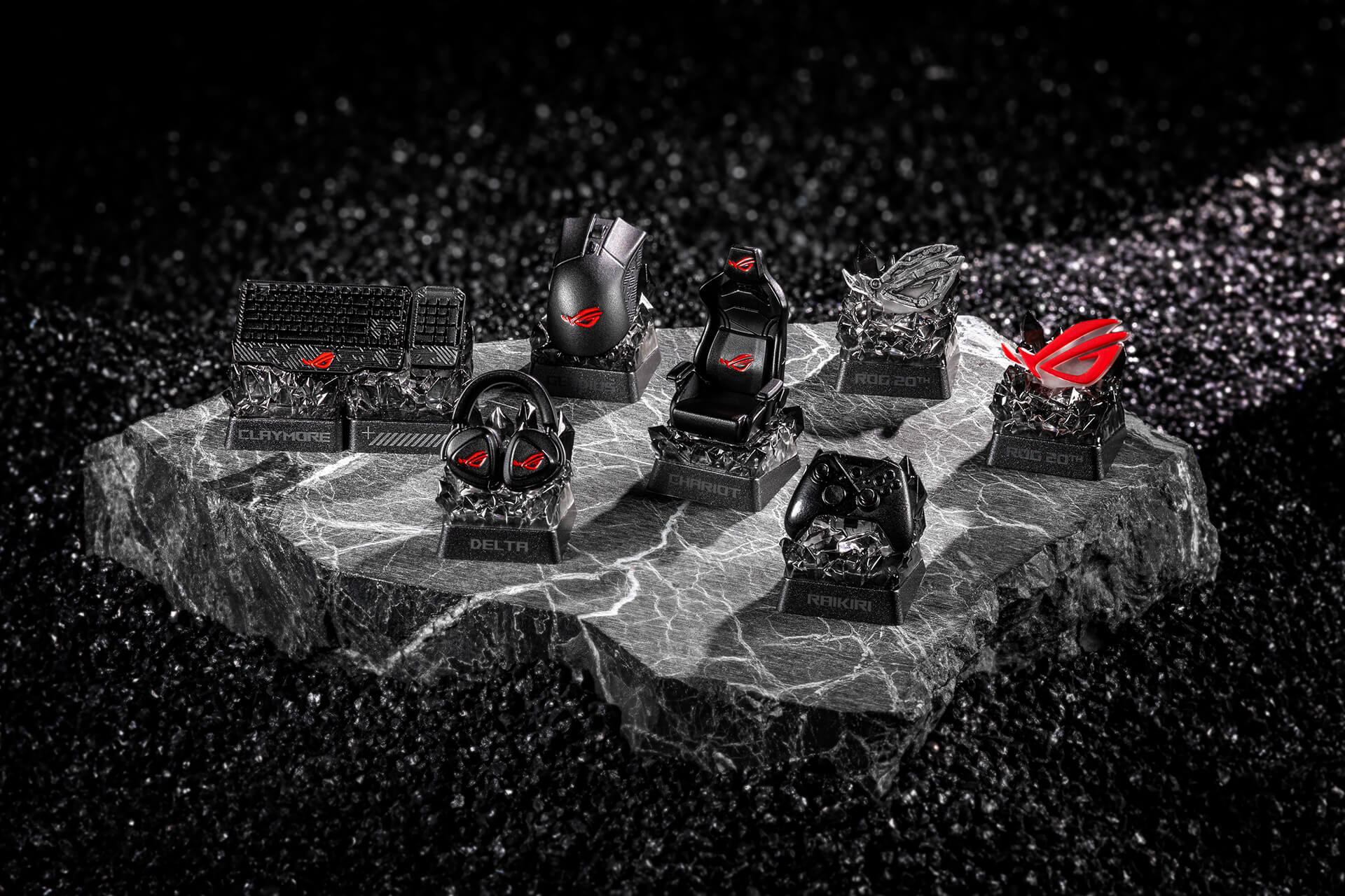 ROG Keycap Mystery Box Edition 20 Full Set stand on a rock surface with ambient lighting