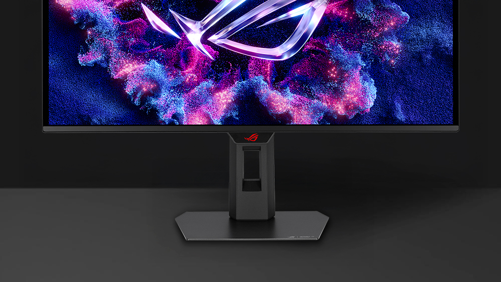 XG27ACDMSR 正面图,展示手机放置于设备凹槽中