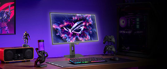 ROG XG27ACDMSR 曲面电竞显示器,屏幕上亮起 ROG Logo。图中展示了包含耳机、键盘、鼠标和电脑主机的全套桌面场景。右侧显示的 BlackShield 图标,示意该面板拥有更高的硬度与更佳的抗刮擦性能。