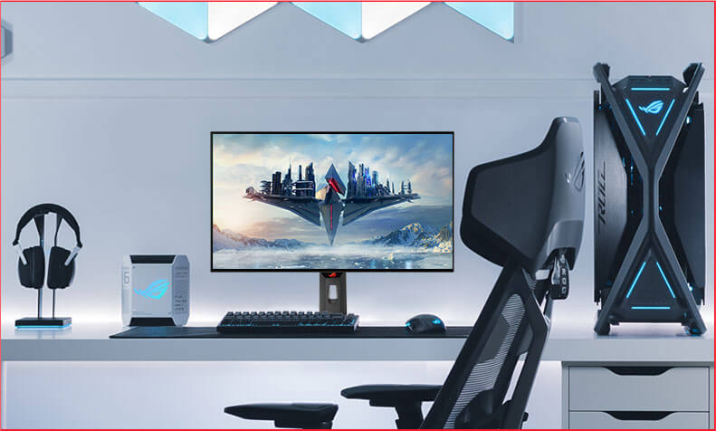 ”A gaming setup with a XG27AQDMG along with a keyboard, mouse, headset, and PC