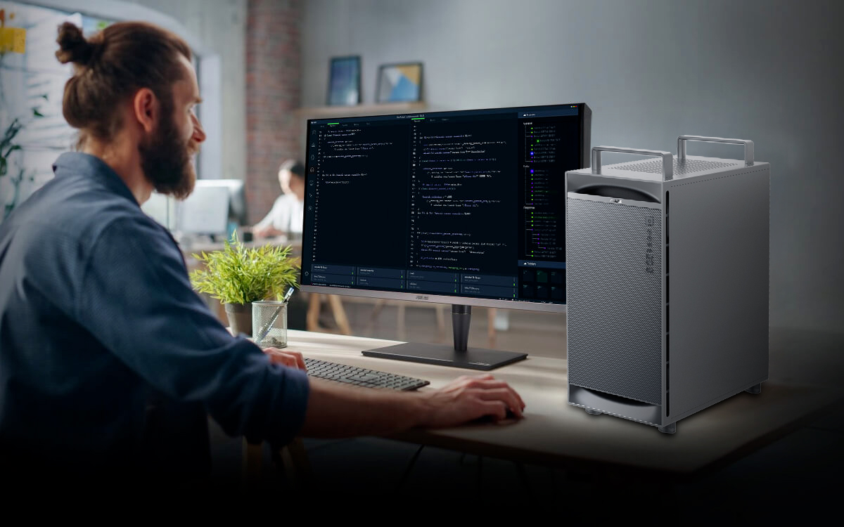 A man is using ASUS ExpertCenter Pro ET900N G3 to enjoy the ultimate compute performance
