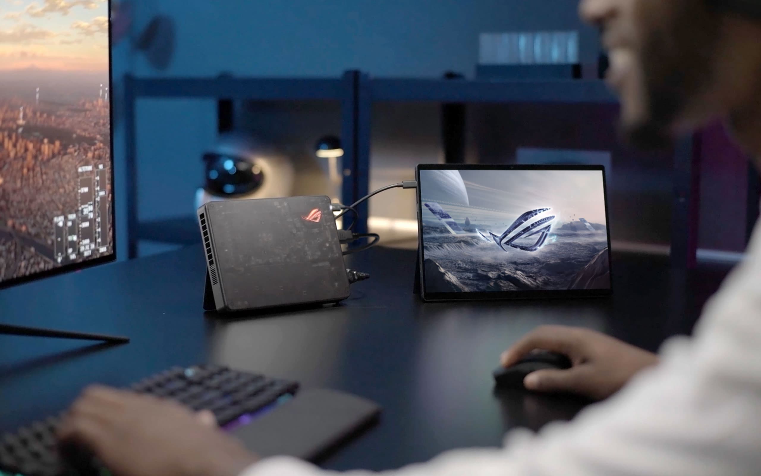 Scenario photo showing the XGM with a Flow Z13 set up on a desk in a modern workspace environment.