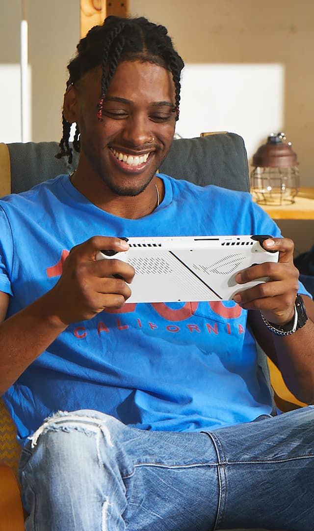 The picture of black man playing with ROG ALLY