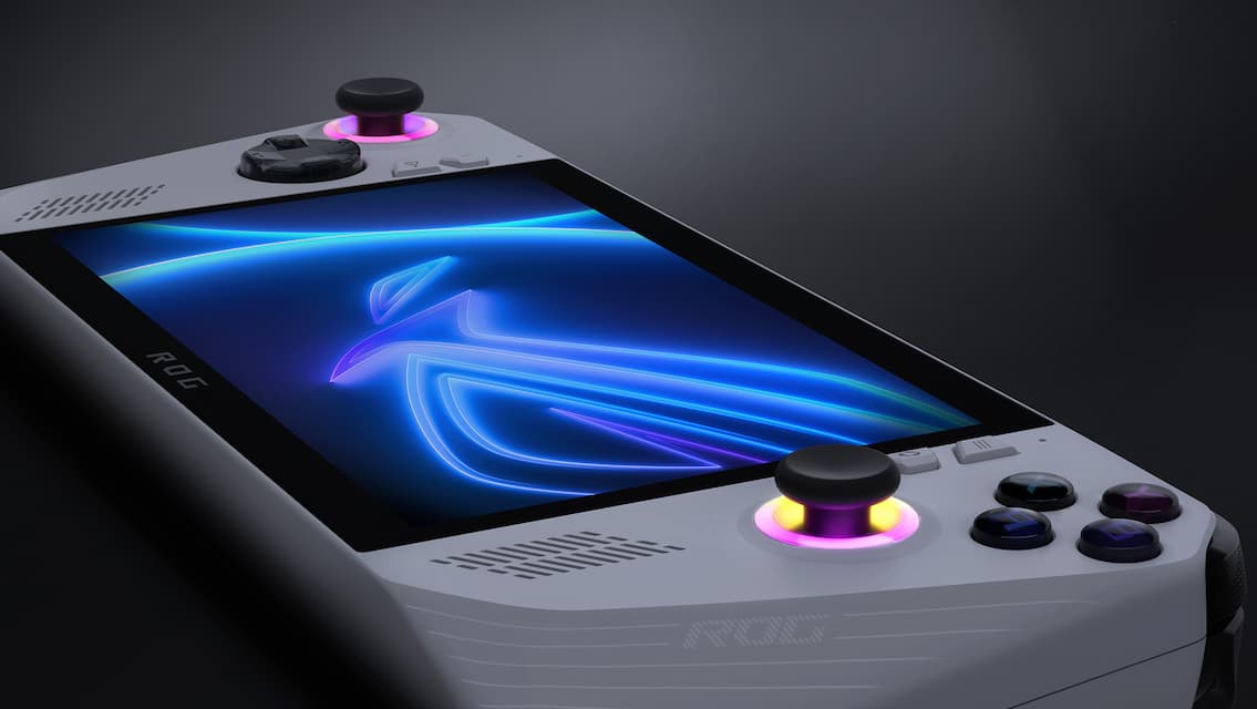 ROG Ally on a table, with the screen and RGB illumination visible.