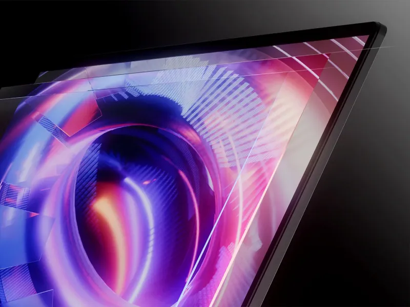 ROG Strix 笔记本电脑在屏幕上显示抽象图像。