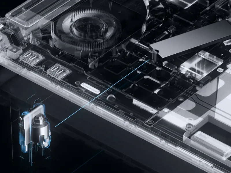 ROG Strix 笔记本电脑的 X 光视图,显示了风扇、存储和其他电路。