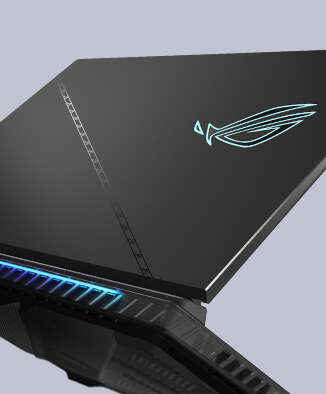 The laptop lid is shown, with the slash design reflecting the surrounding light.