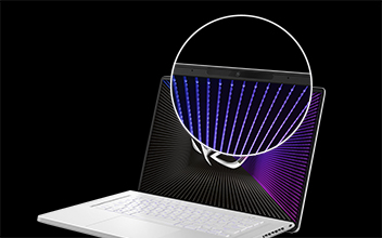 Extreme closeup of the integrated webcam on the top bezel of the screen. 