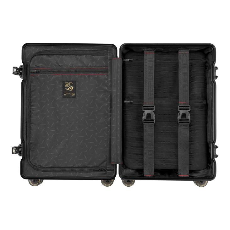 Interior view of an open black ROG suitcase with branded compartments, a '20th Anniversary Republic of Gamers' tag, and coordinates on the wheels
