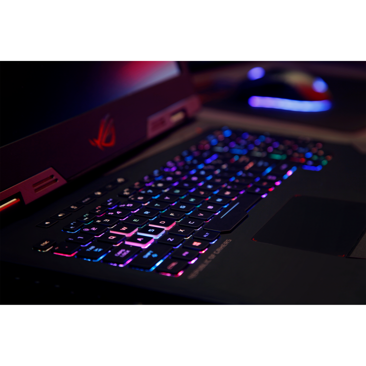 Close-up shot of ROG G703 keyboard with RGB lighting.