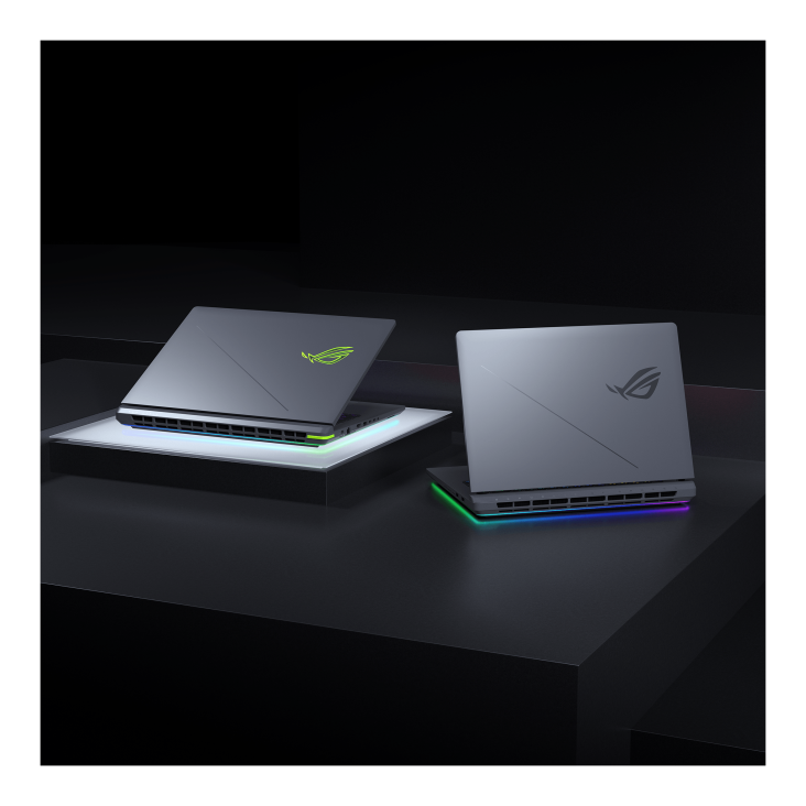  ROG Strix G18 (2026) presents its formidable side, dynamic blue underglow, and comprehensive rear ports.